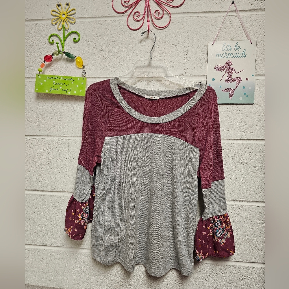 Pretty cozy Maurice's blouse with floral sleeve detail